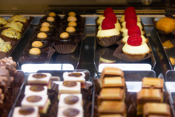 istock Variety of bite cakes with raspberry, chocolate and cookies 1447840542
