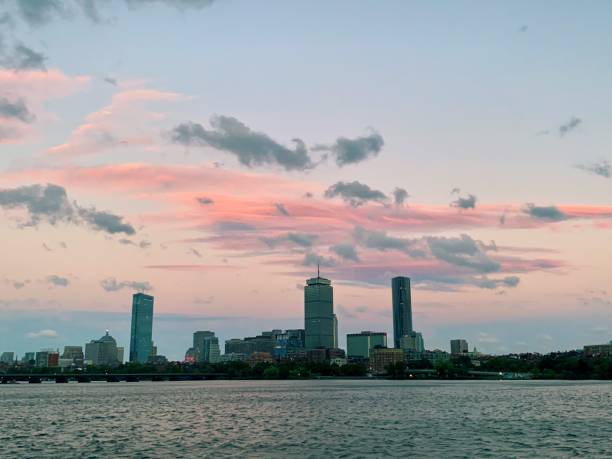 istock River in front of modern city skyline at sunset 1447845048