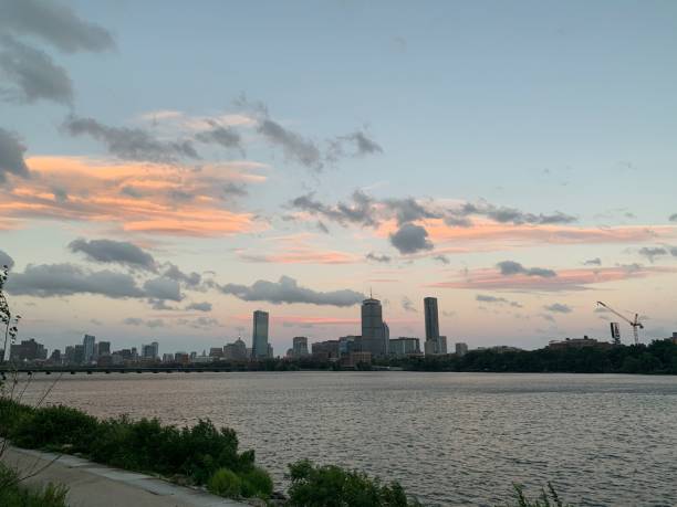 istock River in front of modern city skyline at sunset 1447845054