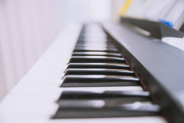 istock Closeup of the synthesizer keyboard. Selected focus. 1447845230