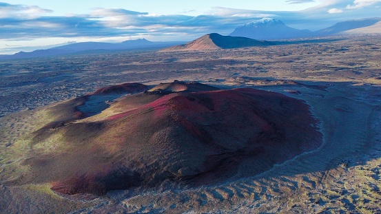 An aerial of Mauna Kea at sunrise volcano landscape around