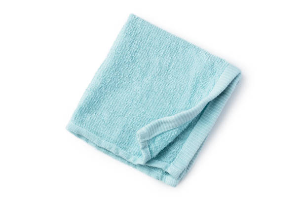 istock Folded blue towel isolated on white background 1447847127