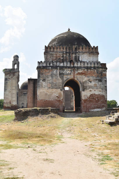 istock Alif Khan Masjid, main gateway vertical view, build in 1325 AD and constructed by Alif Khan Bhukai, a childhood friend of Mahmud Begada, Dholka, Gujrat, India 1447850084