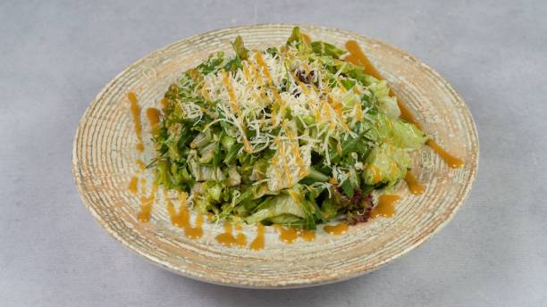 istock Closeup shot of a caesar salad 1447850454