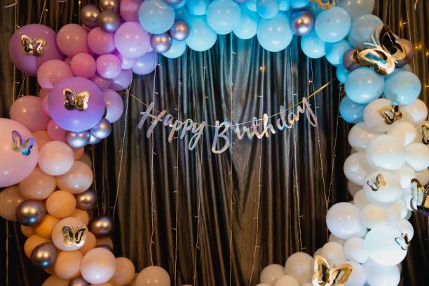 istock Birthday venue decorations with colorful balloons 1447851044