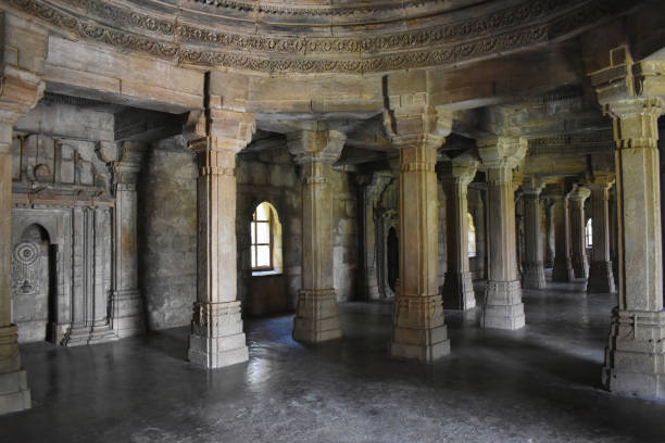istock Shaher ki Masjid, Interior view, Stone carvings work on Pillars, Wall and Dome, built by Sultan Mahmud Begada 15th - 16th century. A UNESCO World Heritage Site, Gujarat, Champaner, India 1447851526