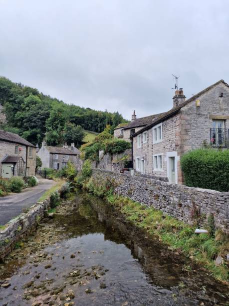 istock Peak district national park with grass and dirty water 1447852337