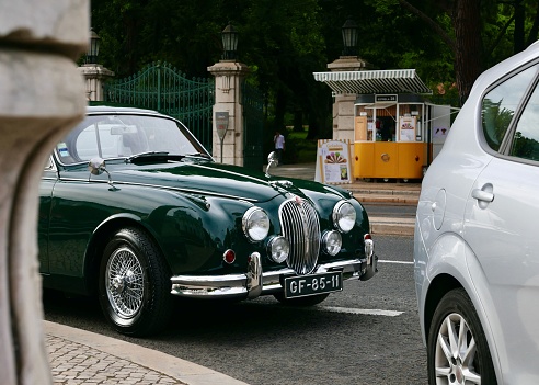 Lissabon, Portugal – June 24, 2017: A vintage classic car jaguar mark 2 racing green parked on the street