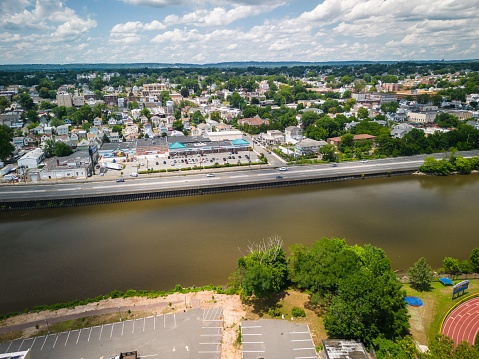 An aerial view of the city of North Arlington, the borough in Bergen County in New Jersey on a sunny day, with the Passaic River along the city