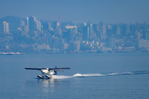 Vancouver, Canada – October 17, 2022: A landing sea plane in the downtown Vancouver