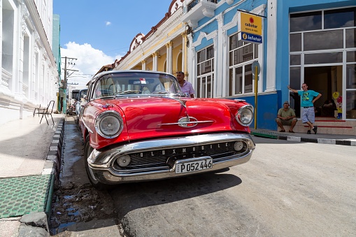 Santiago de Cuba, Cuba – March 03, 2016: A closeup shot of classic cars parked in the street