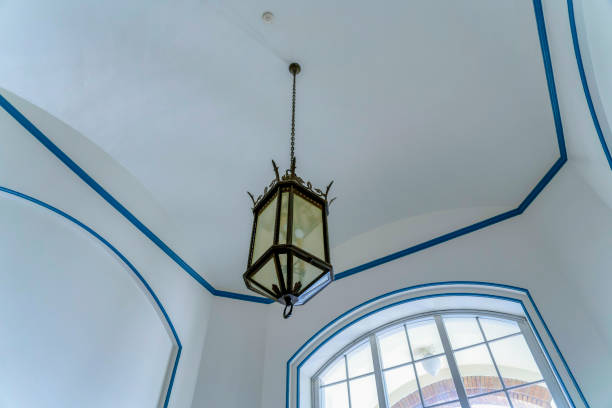 istock Single lamp chandelier in a low angle view at San Jose, California 1447859155