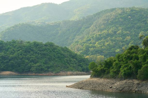 istock Beautiful landscape at Shing Mun reservoir surrounded by tree-covered mountains. 1447860385