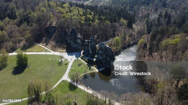 Aerial View Of The Externsteine Sandstone Rock Formation With Greenery And A River On The Right Side Stock Photo - Download Image Now