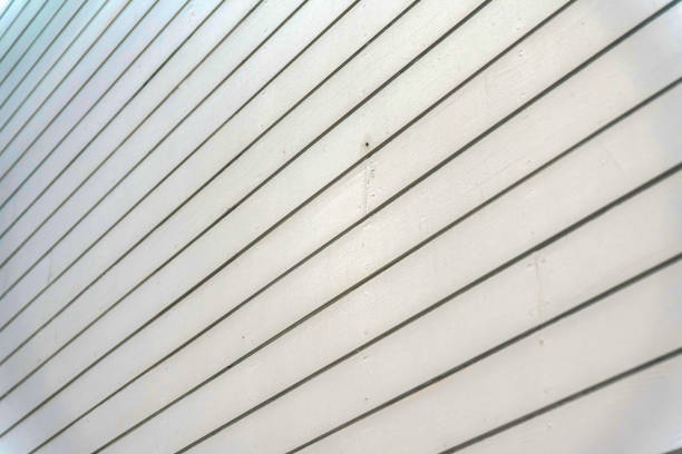 istock Light gray wooden board wall cladding at San Francisco, California 1447863148