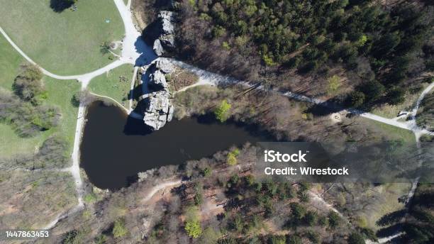 Aerial Shot Of The Externsteine Sandstone Rock Formation Surrounded By Trees Stock Photo - Download Image Now