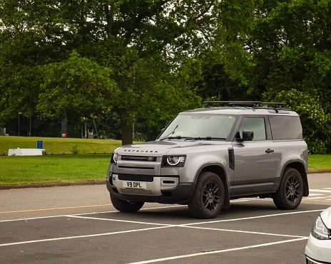 Corley, United Kingdom – June 04, 2022: Silver Land Rover Defender 4x4 off-road British vehicle