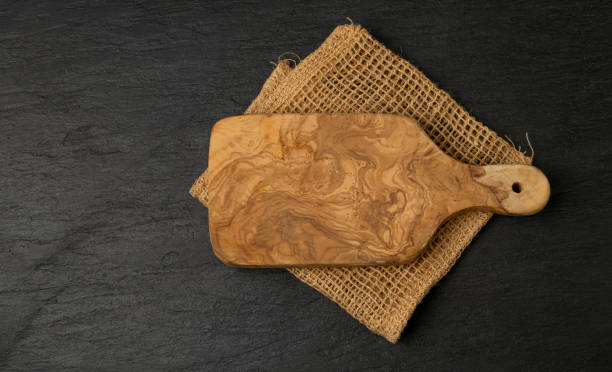 istock Old Wood Cutting Board Mockup, Vintage Chopping Board Background, Rustic Napkin, Empty Cut Desk Top View 1447864401