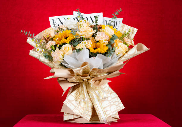 istock bunch of beautiful flowers as gife on red at horizontal composition 1447873993