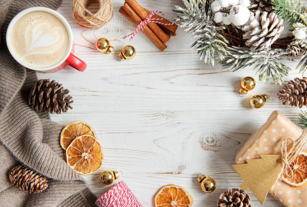 istock Christmas Decoration. Holiday Decorations on White Wooden Background. 1447876340
