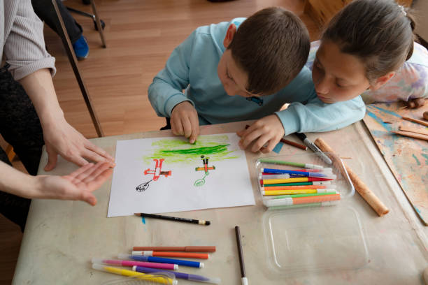 istock Kids in art class 1447877383