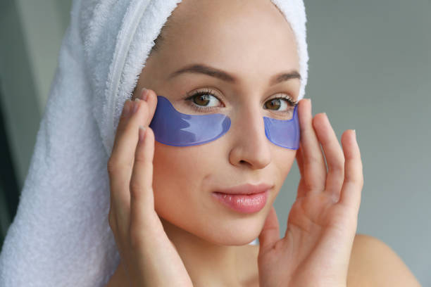 istock Female model with under eye patches. 1447877594