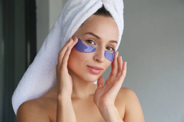 istock Female model with under eye patches. 1447877655