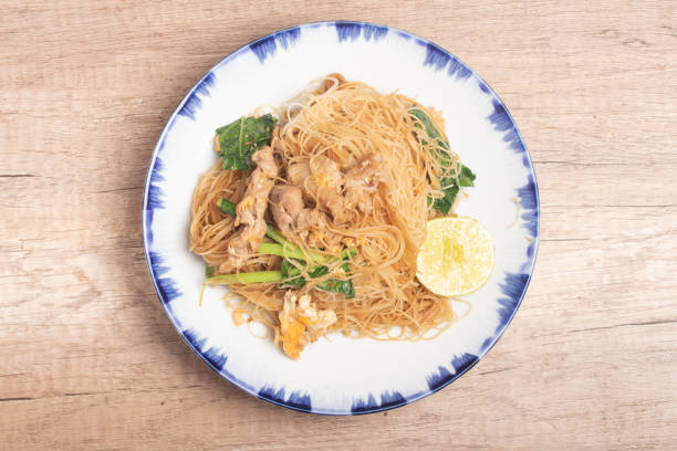 istock Fried noodles with black sauce with pork and vegetables 1447880042