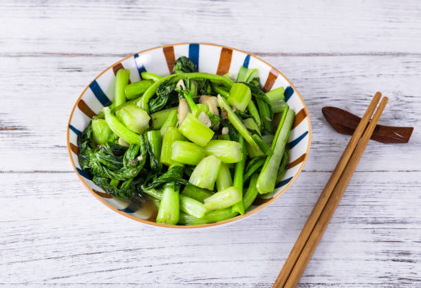 Stir-fry small green vegetables