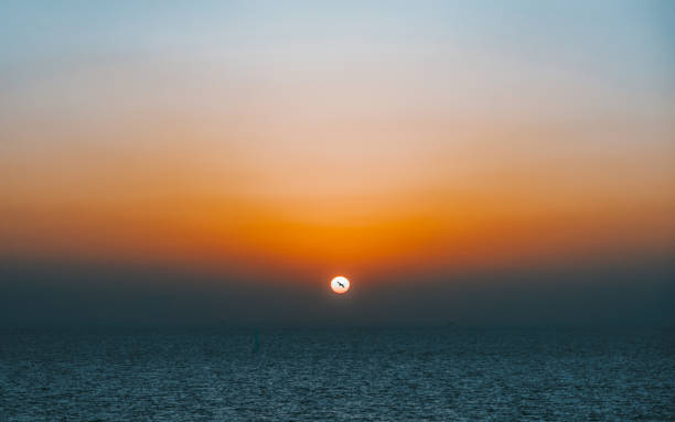 istock Sunset over the sea 1447882689