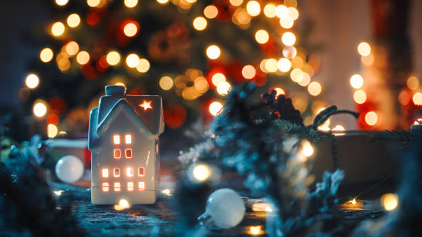 istock The little house with candle and tree as background 1447885031