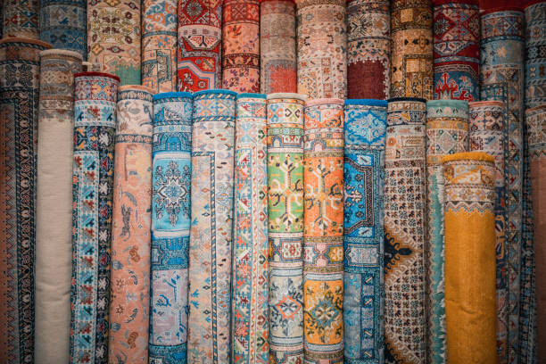 istock Assorted Moroccan handmade rugs carpet display for sale at souk, Fez, Morocco 1447885242