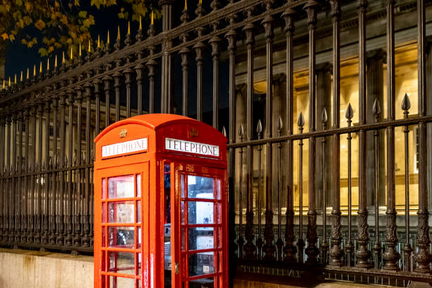 Traditional British red Telephone booth outside the British Museum Traditional British red Telephone booth outside the British Museum. british museum stock pictures, royalty-free photos & images