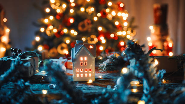 istock The little house with candle and tree as background 1447886665