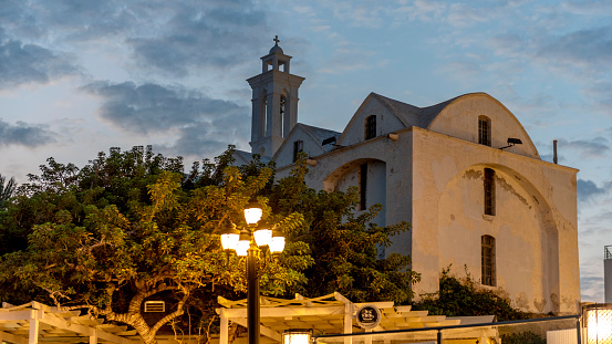 A church in the town of Kyrenia in Cyprus seen at sunset