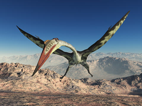 Computer generated 3D illustration with the pterosaur Quetzalcoatlus over a mountainous landscape