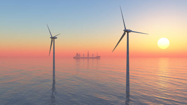 Offshore wind turbines and cargo ship at sunset Computer generated 3D illustration with offshore wind turbines and cargo ship at sunset offshore wind farm stock pictures, royalty-free photos & images