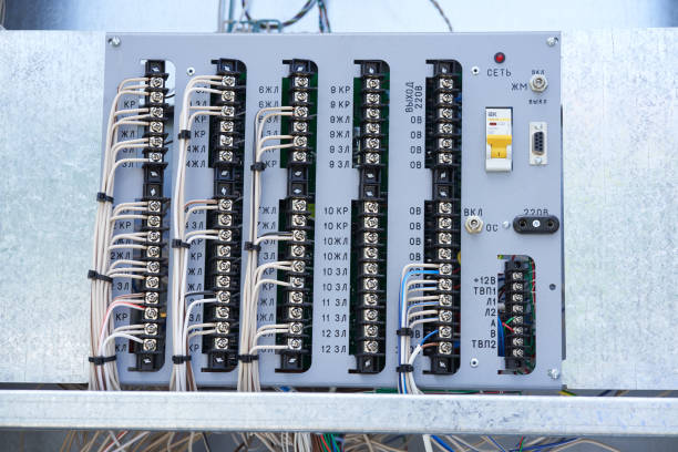 istock Electric control panel. The wires are connected to residual current circuit breakers and voltage monitoring relays. High quality photo 1447889874