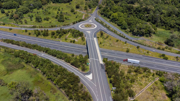 istock Motorway Roundabout and Intersection Aerial View 1447890884