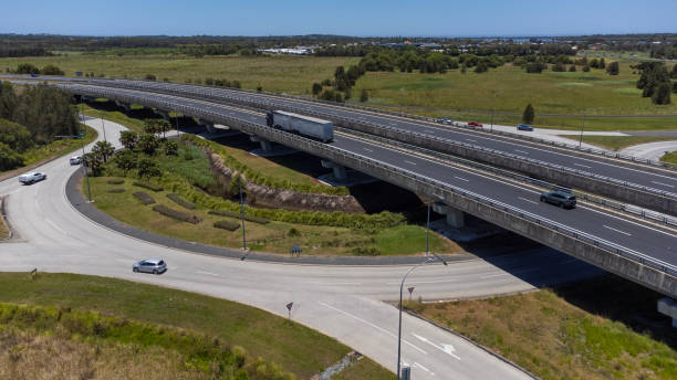 istock Motorway Roundabout and Intersection Aerial View 1447890891