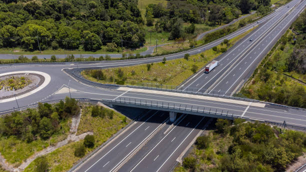 istock Motorway Roundabout and Intersection Aerial View 1447890904