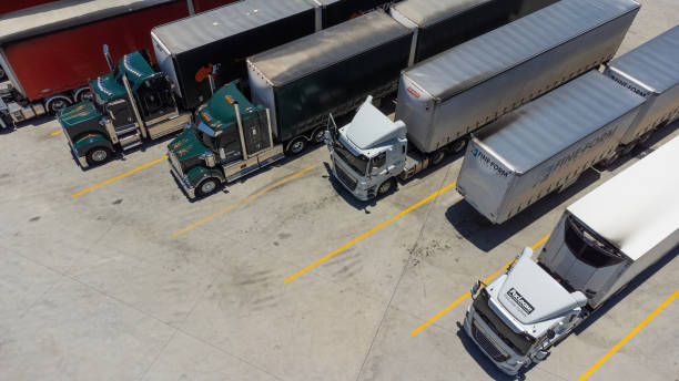 istock Semi Trailer Trucks Parked at a Truck Stop 1447890915