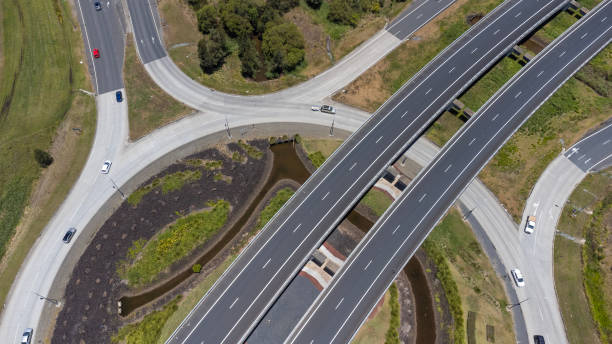 istock Motorway Roundabout and Intersection Aerial View 1447890925