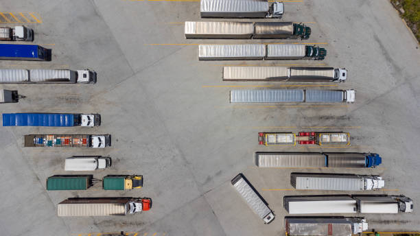 istock Semi Trailer Trucks Parked at a Truck Stop 1447890929