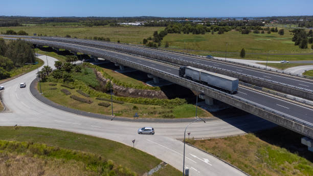 istock Motorway Roundabout and Intersection Aerial View 1447890930