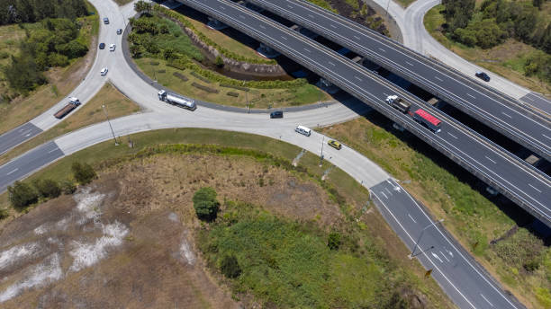 istock Motorway Roundabout and Intersection Aerial View 1447890936