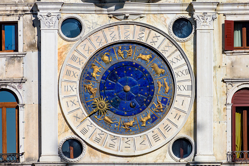 Ancient astronomical clock in center of Venice, Italy