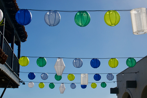 Festive string lights with colorful paper lanterns