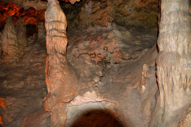 istock cave with stalactites and the lightning isolated, close-up 1447892958