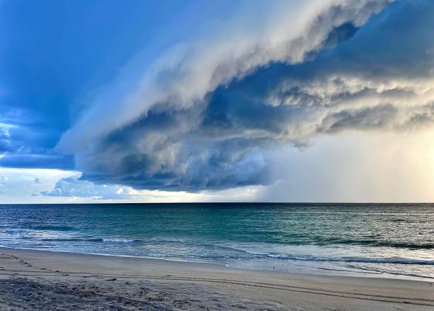 istock Storm cloud moving in at the beach.. beautiful 1447893247